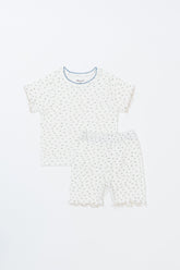 Avauma Mellow Days Short Sleeve Baby Set in Vanilla Herb, flat lay. Soft ribbed fabric with small green floral print and blue trim, perfect for summer.
